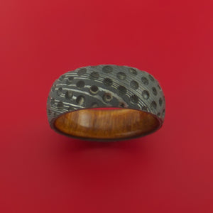 Damascus Steel Ring with Milled Golf Ball Dimple Inlay and Interior Hardwood Sleeve Custom Made Band