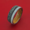 Titanium Dragon Celtic Ring with Meteorite and Dinosaur Bone along with a Hardwood Sleeve