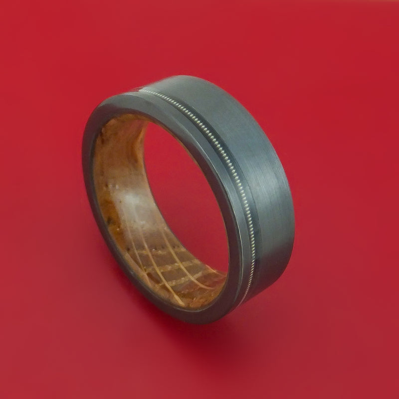 Black Zirconium Ring with Nickel-Wound Guitar String Inlay and Interior Hardwood Sleeve Custom Made Band