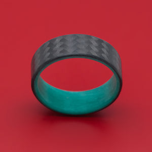 Carbon Fiber Ring with Teal Glow Sleeve