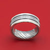 Platinum Ring with Meteorite and Dinosaur Bone Inlays and Kuro Damascus Steel Sleeve