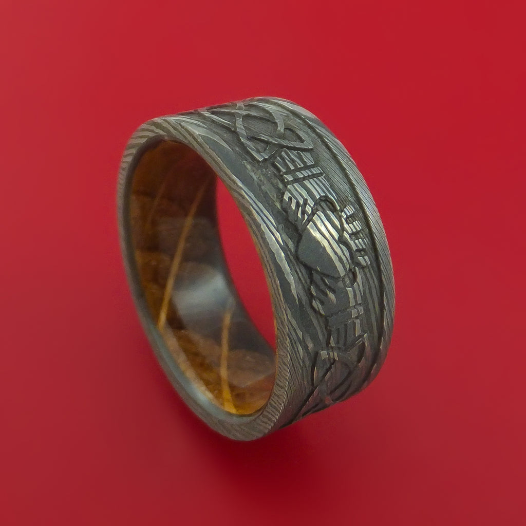 Damascus Steel Ring with Claddagh Milled Celtic Design Inlay and Interior Hardwood Sleeve Custom Made Band