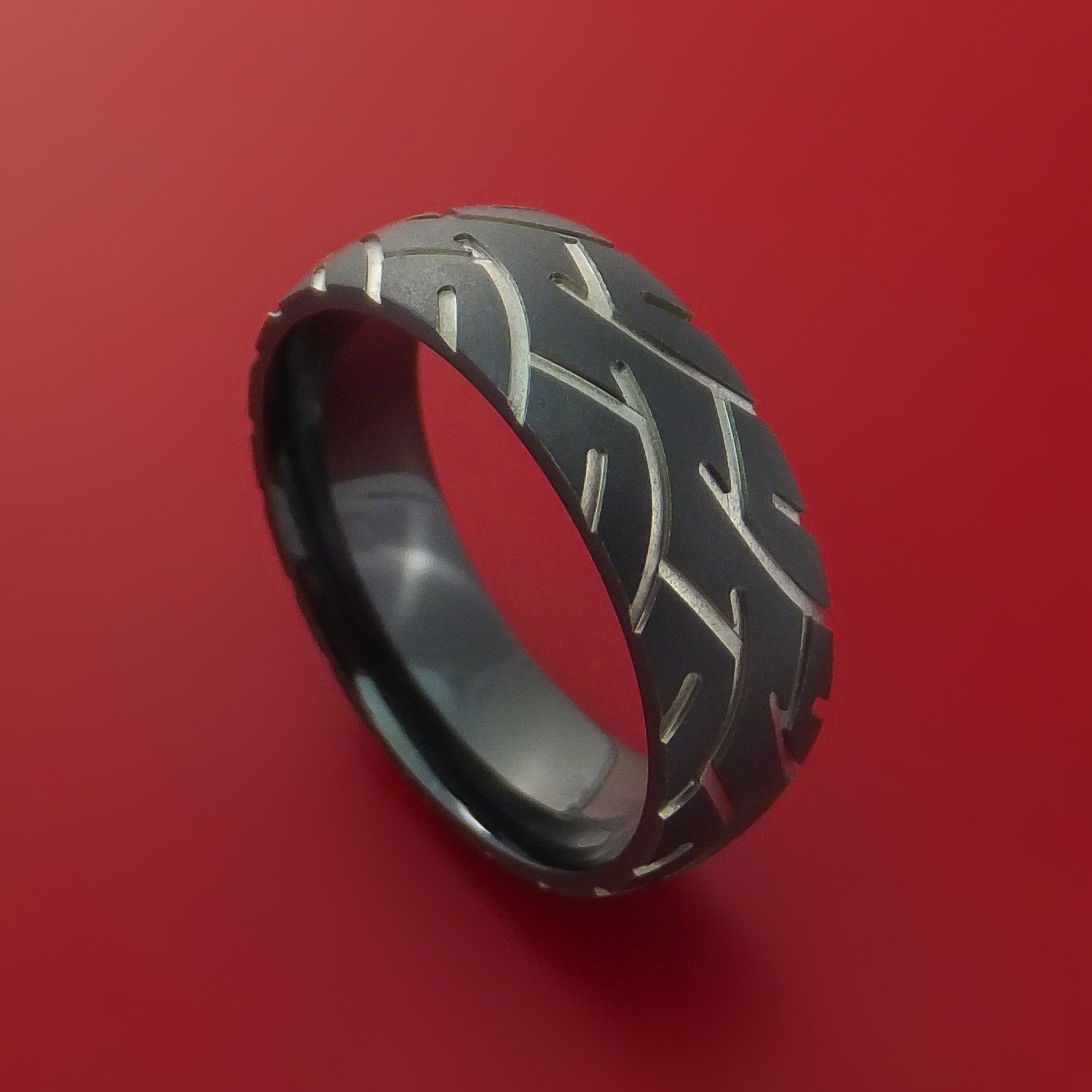 Titanium Ring with Cycle Tire Tread Pattern Inlay Custom Made Men's Wedding  Band – Stonebrook Jewelry