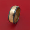 Black Zirconium Ring with 14k Rose Gold Inlay and Interior Hardwood Sleeve Custom Made Band