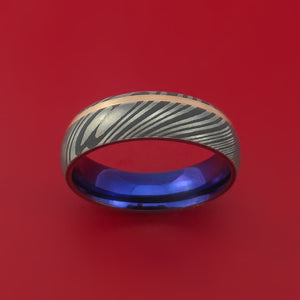 Damascus Steel Ring with 14k Rose Gold Inlay and Interior Anodized Titanium Sleeve Custom Made Band