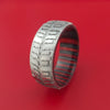 Titanium Ring with Mud Tire Tread Pattern Inlay and Interior Hardwood Sleeve Custom Made Band