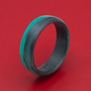 Carbon Fiber Ring with Teal Glow Marbled Design